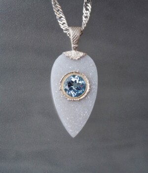 Blue Topaz in White Druze set with Pure Silver