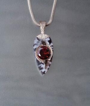 Garnet in an Onyx Geode set with Pure Silver